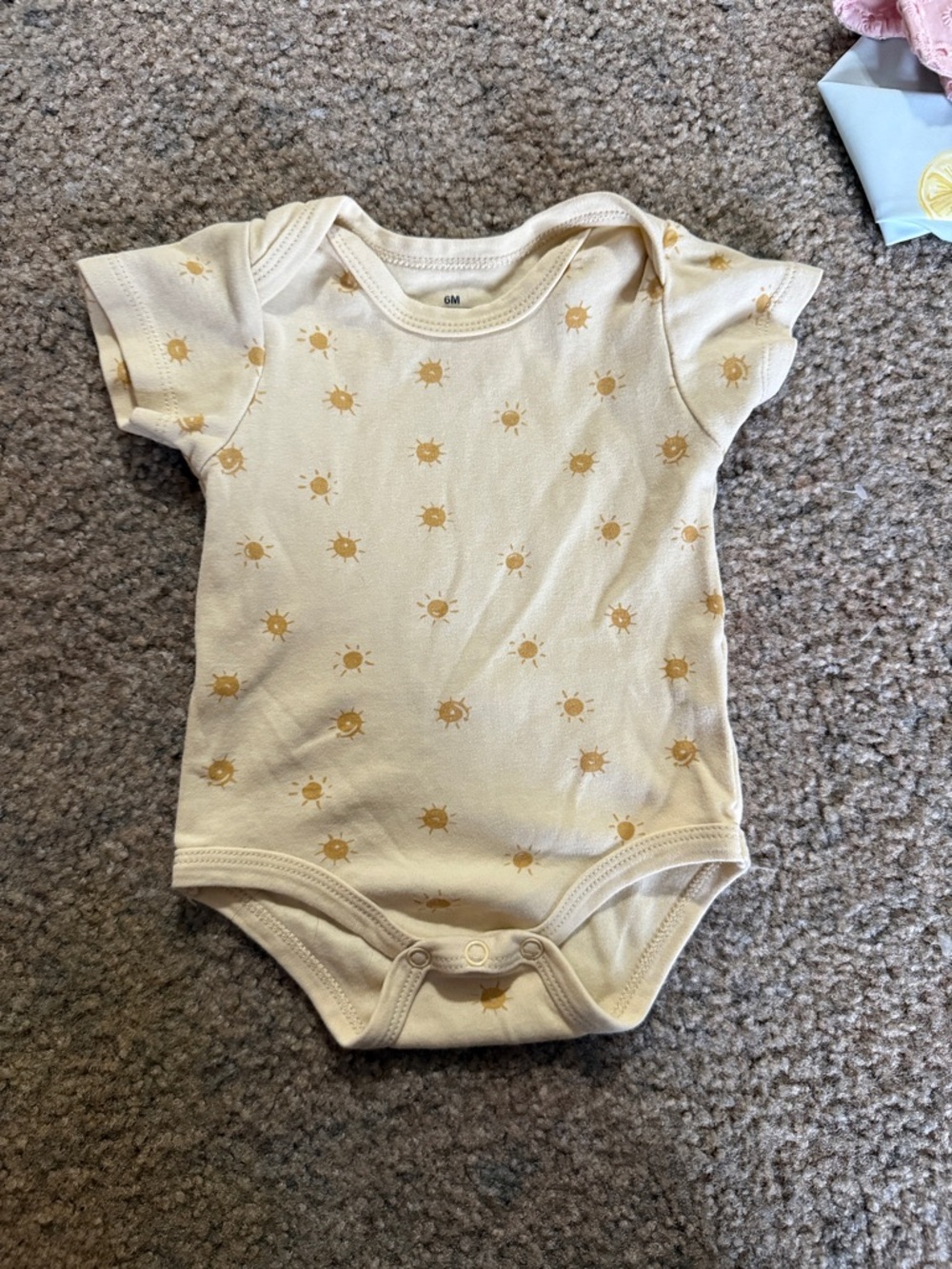 Amazon Cream Baby Bodysuit with Yellow Sun Print